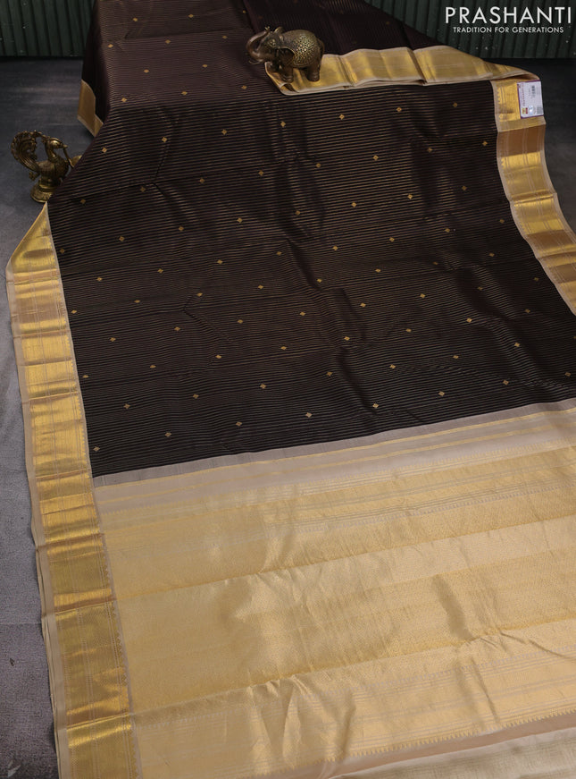 Pure kanchipram silk saree coffee brown and beige with allover vairosi pattern & buttas and zari woven border