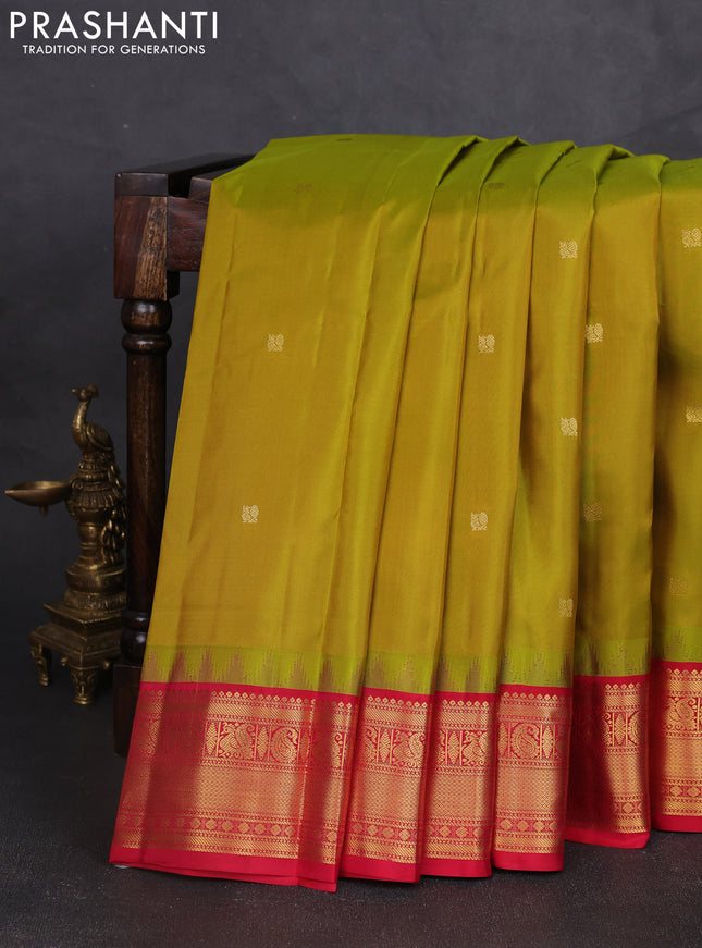 Pure kanchipram silk saree lime green and red with annam zari woven buttas and temple design zari woven border