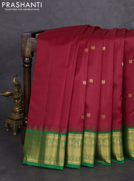Pure kanchipram silk saree maroon and green with annam zari woven buttas and temple design zari woven border