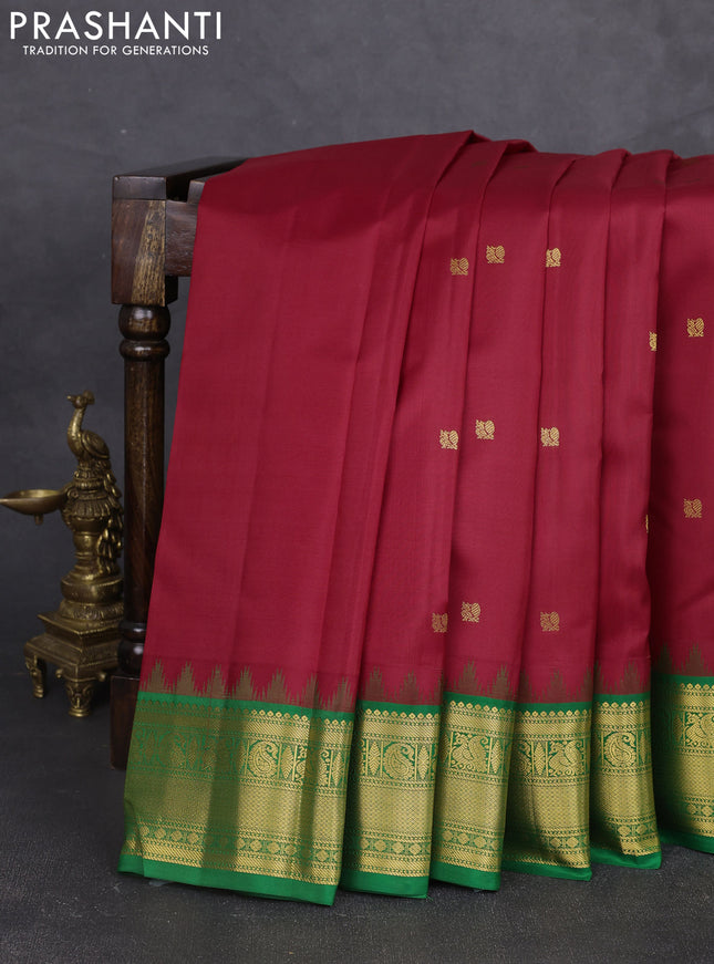 Pure kanchipram silk saree maroon and green with annam zari woven buttas and temple design zari woven border