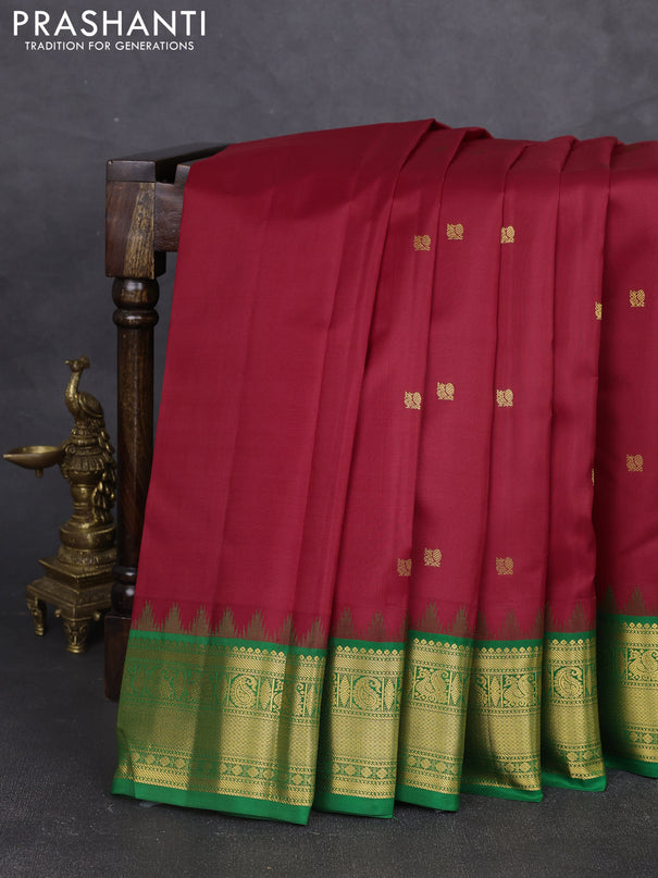 Pure kanchipram silk saree maroon and green with annam zari woven buttas and temple design zari woven border