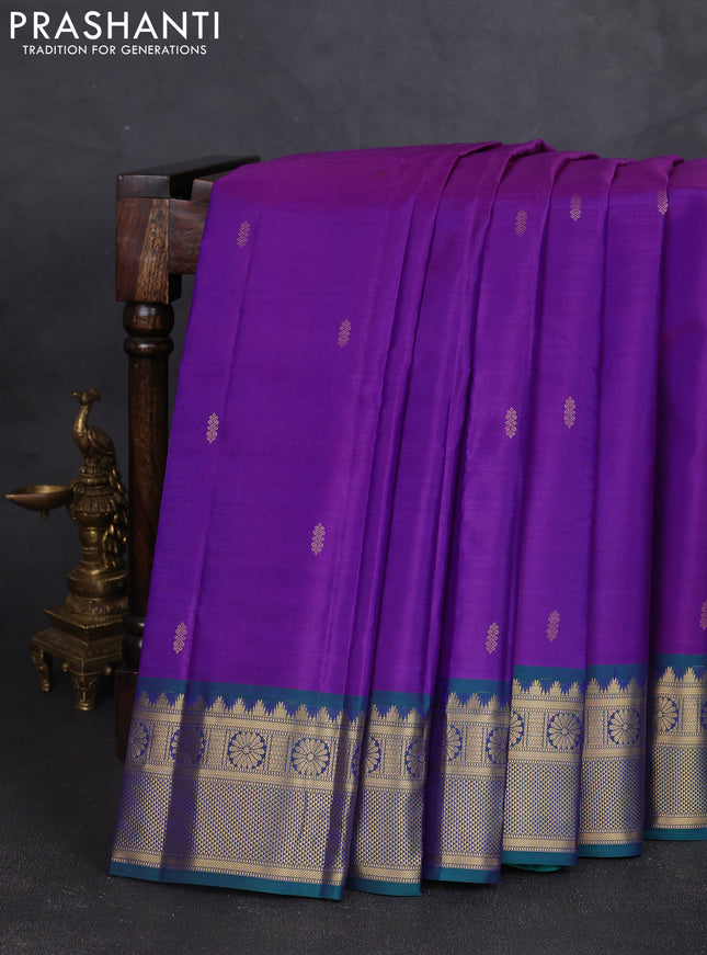 Pure kanchipram silk saree magenta pink and teal green with zari woven buttas and temple zari woven border