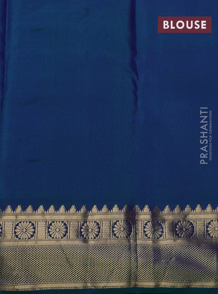 Pure kanchipram silk saree magenta pink and teal green with zari woven buttas and temple zari woven border