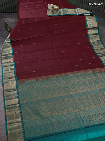 Pure kanchipram silk saree maroon and green with zari woven buttas and zari woven border
