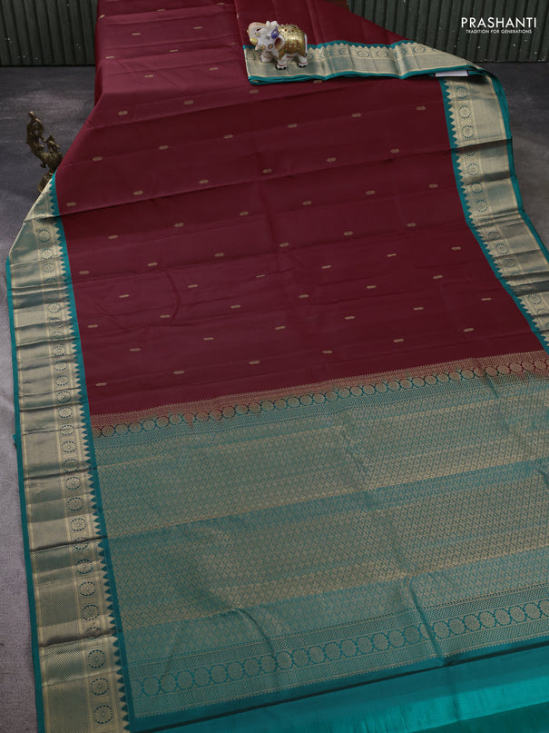 Pure kanchipram silk saree maroon and green with zari woven buttas and zari woven border