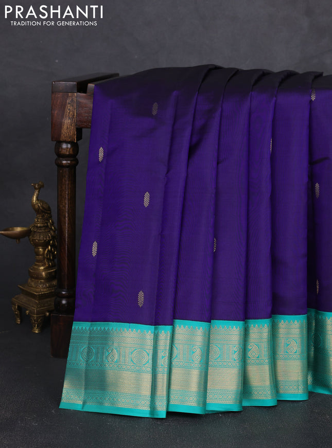 Pure kanchipram silk saree navy blue and teal green with zari woven buttas and zari woven korvai border