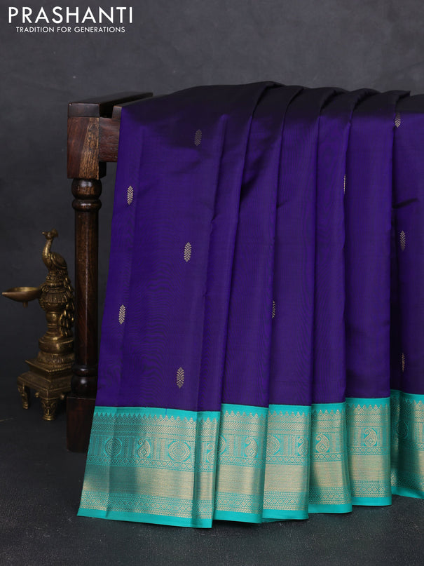 Pure kanchipram silk saree navy blue and teal green with zari woven buttas and zari woven korvai border