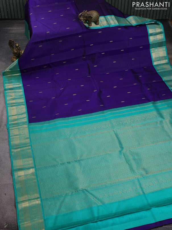 Pure kanchipram silk saree navy blue and teal green with zari woven buttas and zari woven korvai border