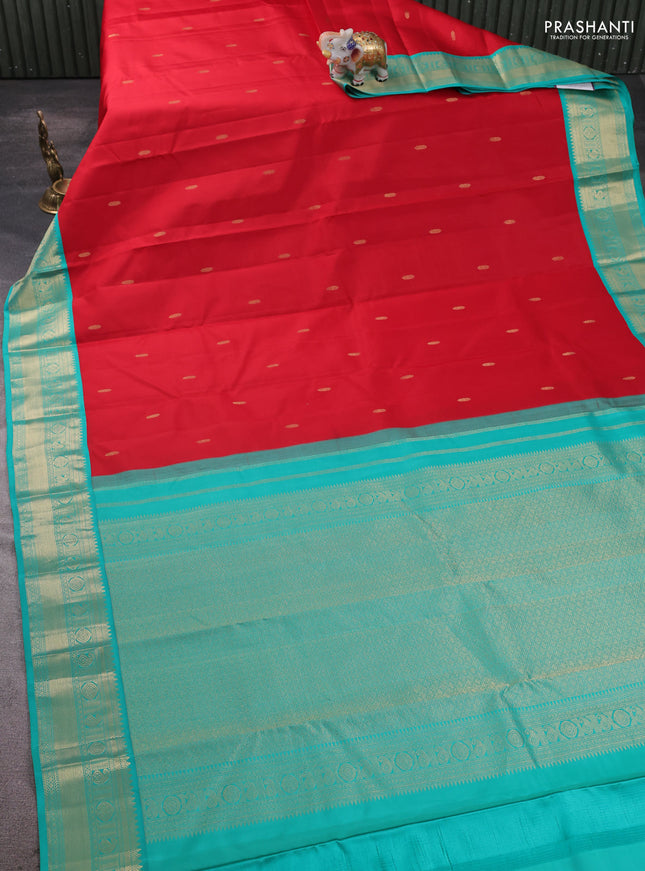 Pure kanchipram silk saree red and teal green with zari woven buttas and zari woven korvai border