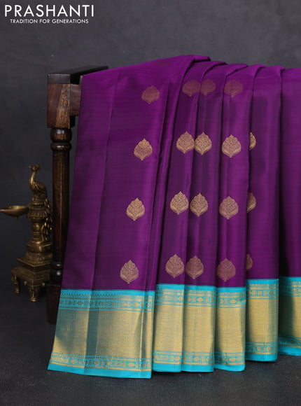 Pure kanchipram silk saree purple and teal blue with zari woven buttas and zari woven korvai border