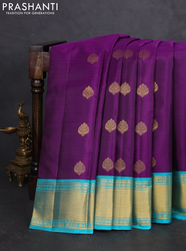 Pure kanchipram silk saree purple and teal blue with zari woven buttas and zari woven korvai border