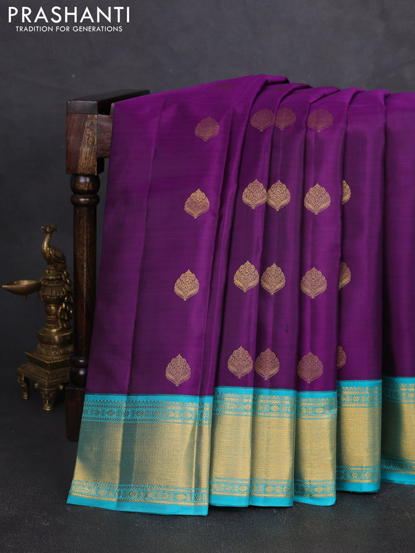 Pure kanchipram silk saree purple and teal blue with zari woven buttas and zari woven korvai border