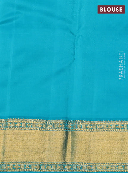 Pure kanchipram silk saree purple and teal blue with zari woven buttas and zari woven korvai border