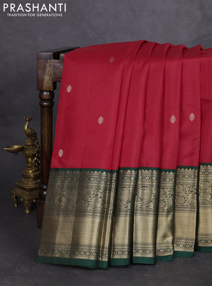Pure kanchipram silk saree red and bottle green with zari woven buttas and long zari woven korvai border