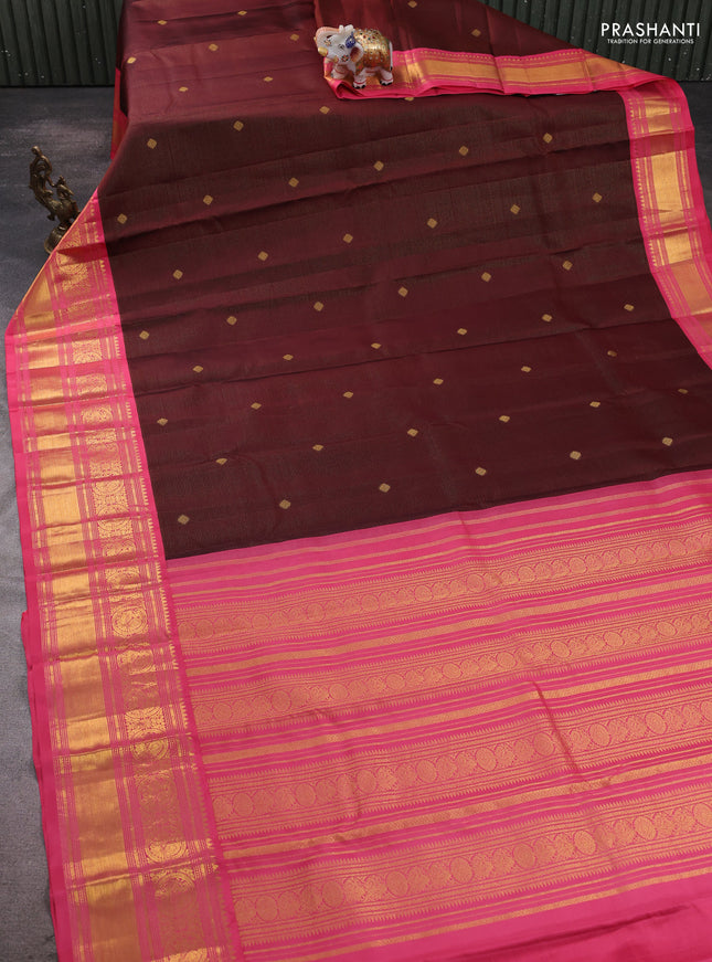 Pure kanchipram silk saree wine shade and peach pink with allover zari weaves & buttas and long zari woven korvai border