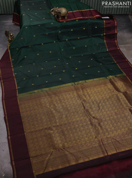 Pure kanchipram silk saree bottle green and deep maroon with zari woven buttas and rettapet zari woven border
