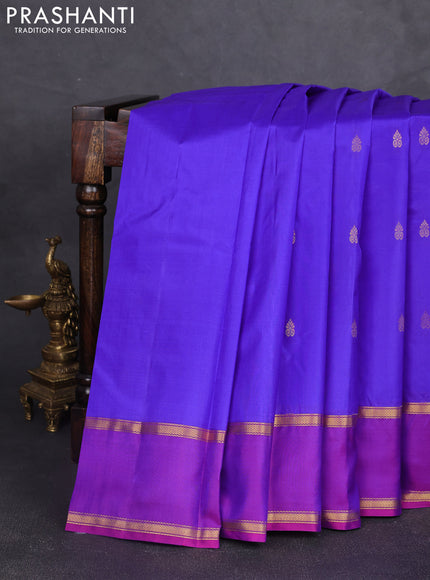 Pure kanchipram silk saree royal blue and purple with zari woven buttas and rettapet zari woven border
