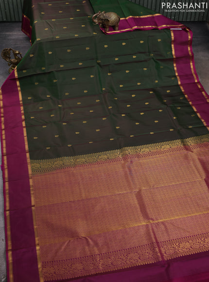 Pure kanchipram silk saree green and purple with zari woven buttas and rettapet zari woven border