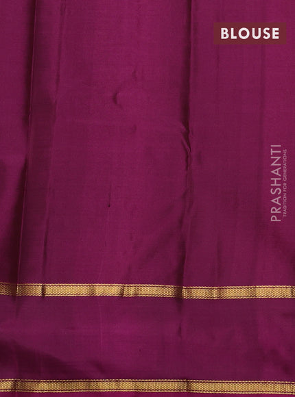 Pure kanchipram silk saree green and purple with zari woven buttas and rettapet zari woven border
