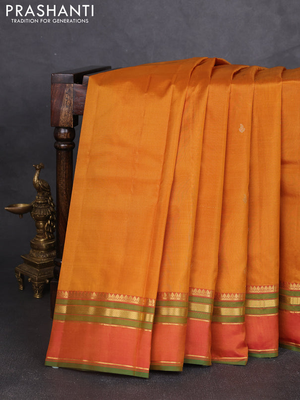 Pure kanchipram silk saree dark mustard and pink with zari woven buttas and rettapet zari woven border