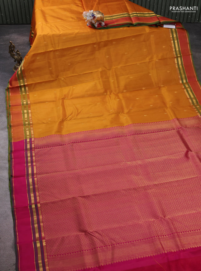 Pure kanchipram silk saree dark mustard and pink with zari woven buttas and rettapet zari woven border