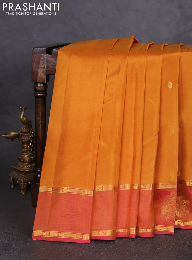 Pure kanchipram silk saree dark mustard and dual shade of pink with paisley zari woven buttas and zari woven butta border