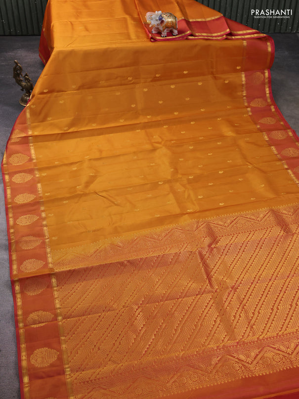 Pure kanchipram silk saree dark mustard and dual shade of pink with paisley zari woven buttas and zari woven butta border