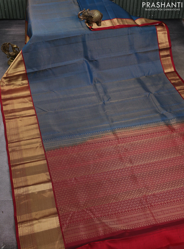 Pure kanchipram silk saree peacock green and maroon with allover small checked pattern and long zari woven korvai border