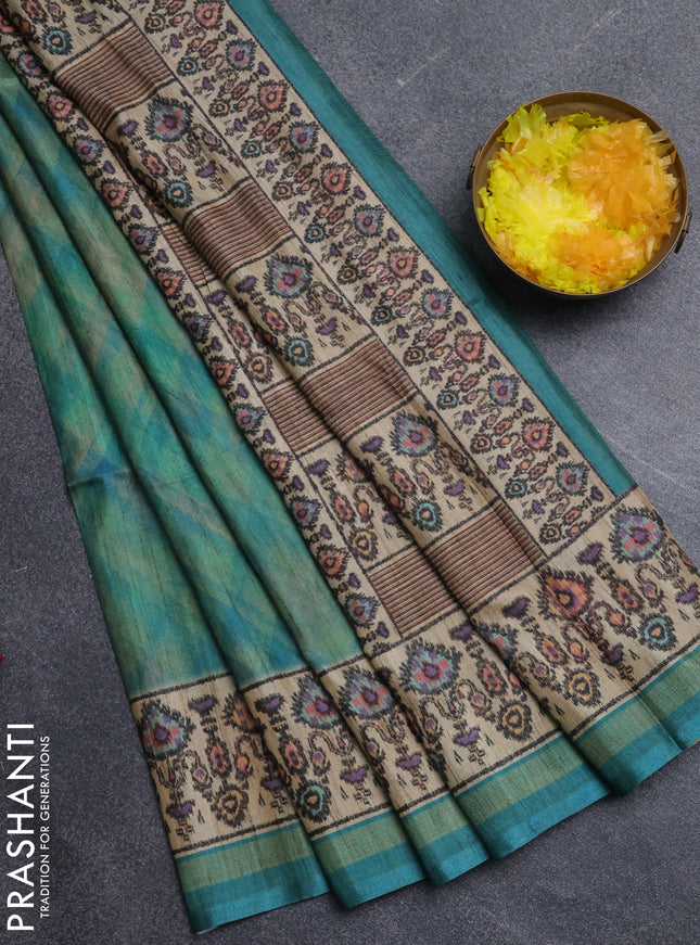 Art tussar saree teal blue and beige with allover geomatric prints and patola printed border