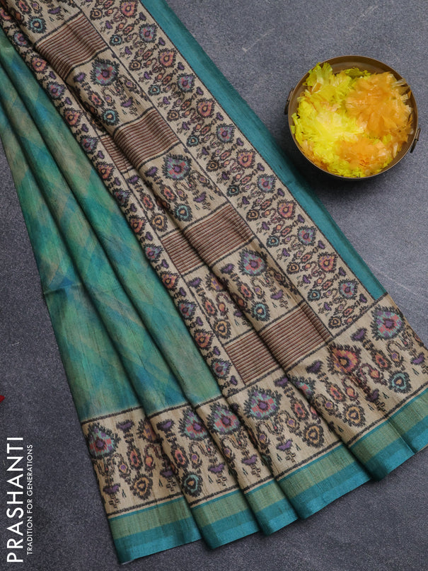 Art tussar saree teal blue and beige with allover geomatric prints and patola printed border