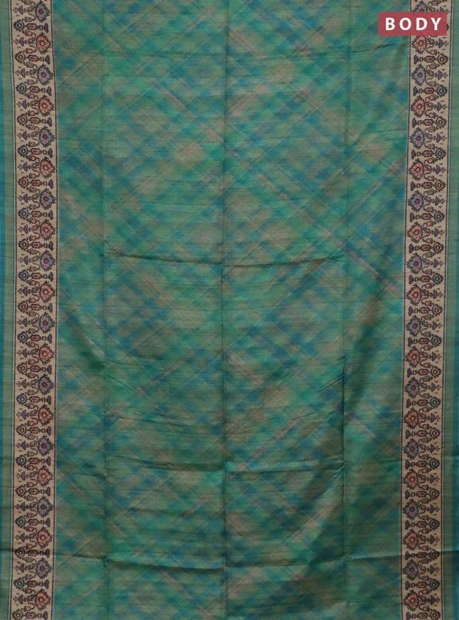 Art tussar saree teal blue and beige with allover geomatric prints and patola printed border