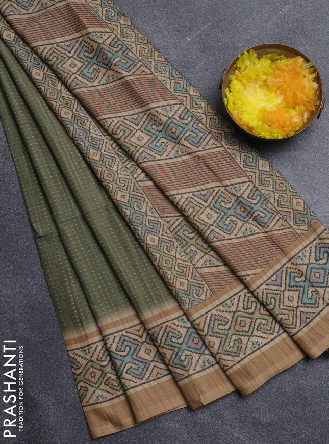 Art tussar saree mehendi green and sandal with allover prints and patola printed border