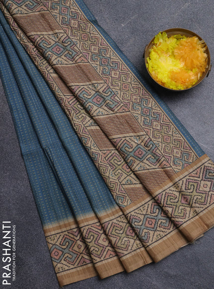 Art tussar saree teal blue and sandal with allover prints and patola printed border