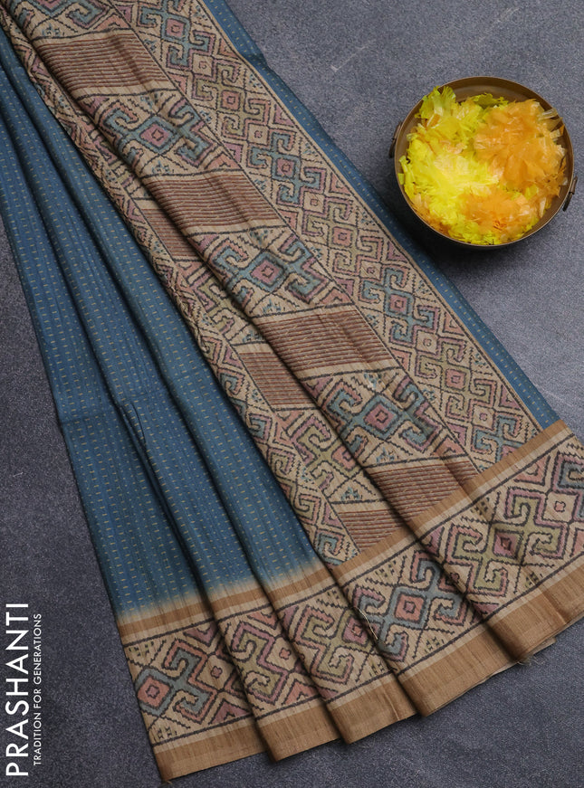 Art tussar saree teal blue and sandal with allover prints and patola printed border