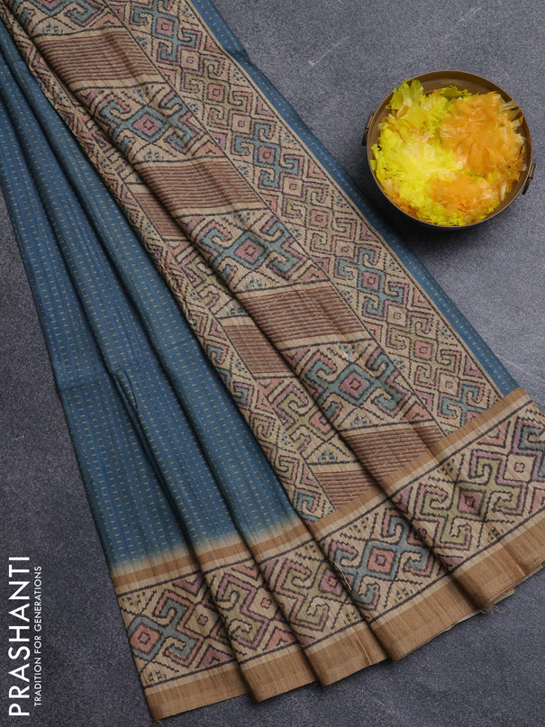 Art tussar saree teal blue and sandal with allover prints and patola printed border