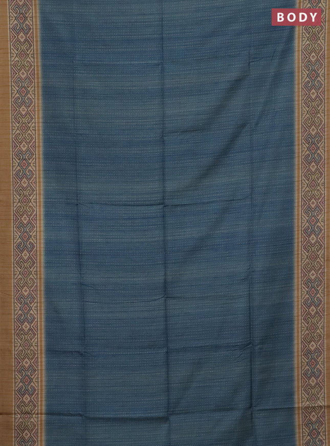 Art tussar saree teal blue and sandal with allover prints and patola printed border