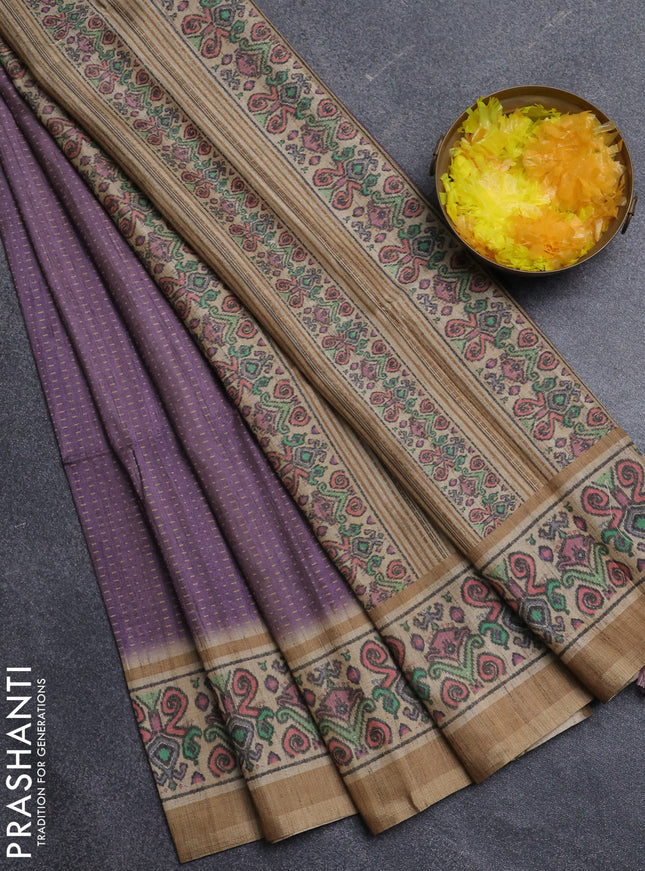 Art tussar saree pastel purple and beige with allover prints and patola printed border
