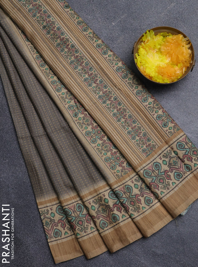 Art tussar saree grey and beige with allover prints and patola printed border