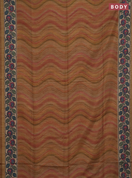 Art tussar saree mustard yellow and beige with plain body and patola printed border