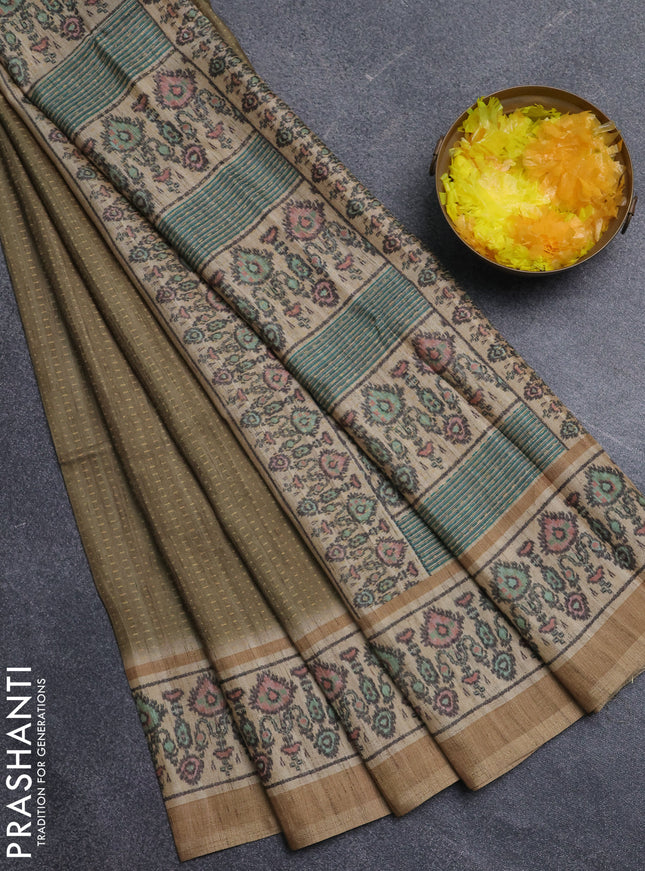 Art tussar saree mehendi green and beige with allover prints and patola printed border