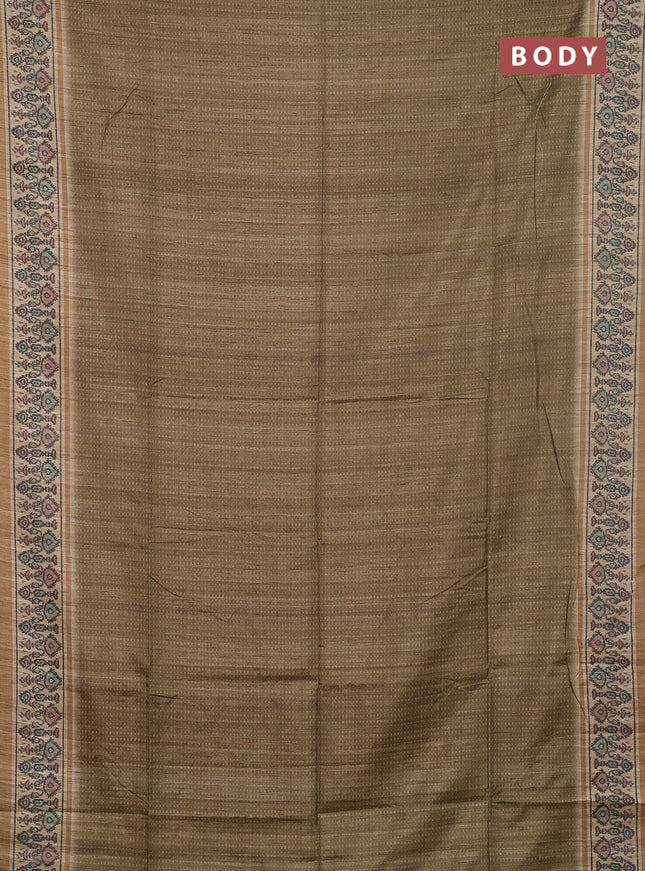 Art tussar saree mehendi green and beige with allover prints and patola printed border
