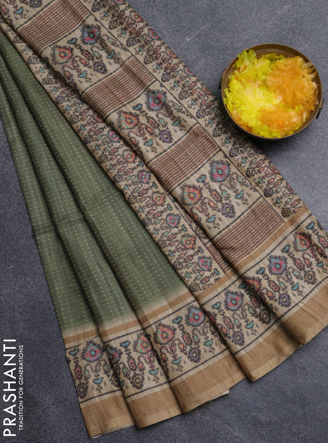 Art tussar saree green and beige with allover prints and patola printed border