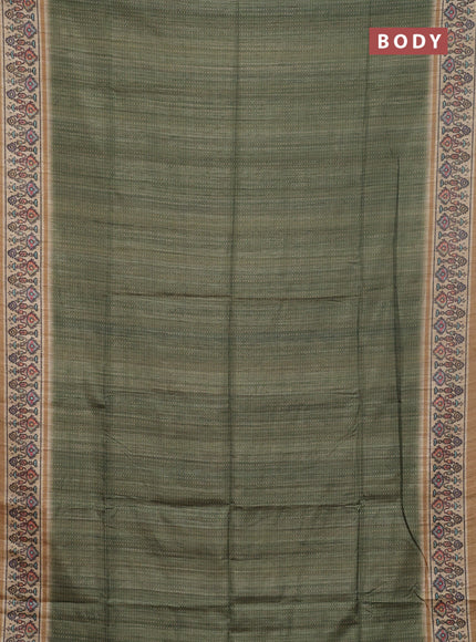 Art tussar saree green and beige with allover prints and patola printed border