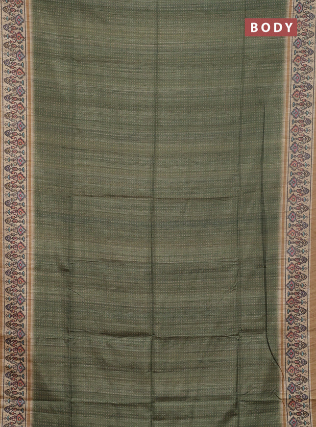 Art tussar saree green and beige with allover prints and patola printed border