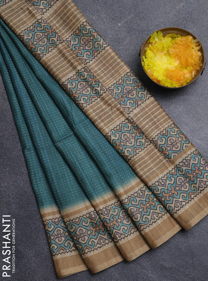 Art tussar saree teal green and beige with allover prints and patola printed border