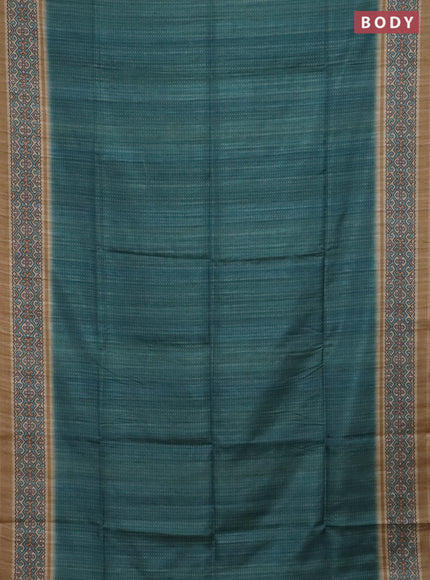 Art tussar saree teal green and beige with allover prints and patola printed border