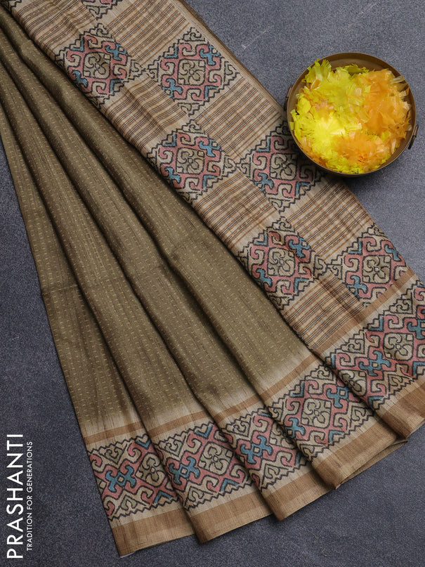 Art tussar saree mehendi green and beige with allover prints and patola printed border