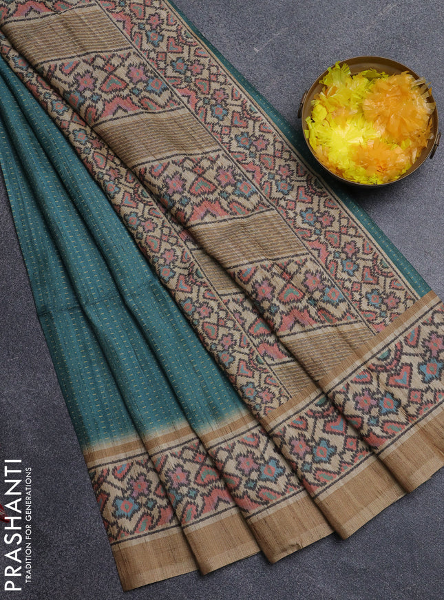 Art tussar saree teal green and beige with allover prints and patola printed border