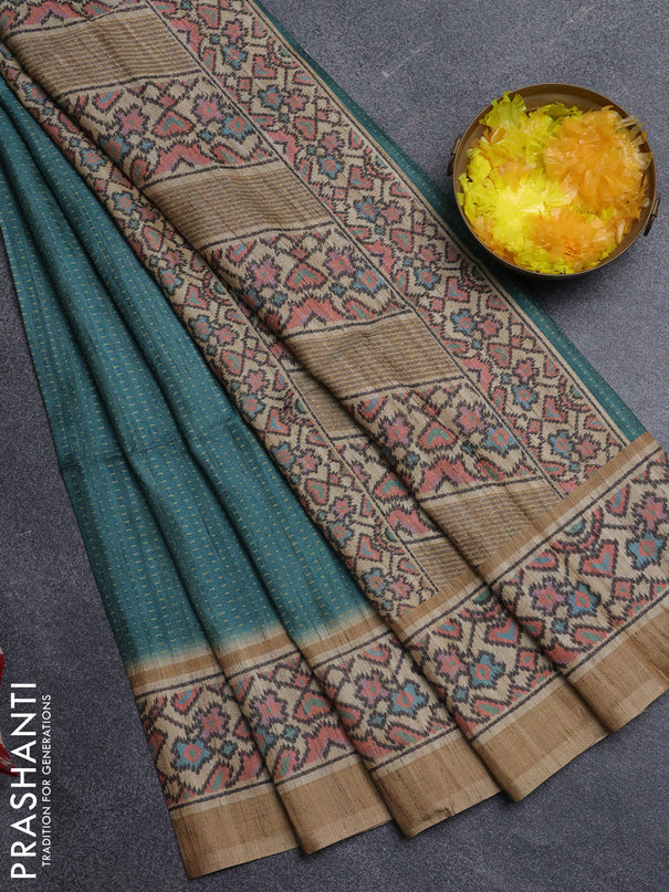Art tussar saree teal green and beige with allover prints and patola printed border