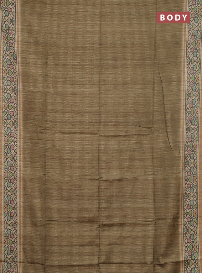 Art tussar saree mehendi green and beige with allover prints and patola printed border